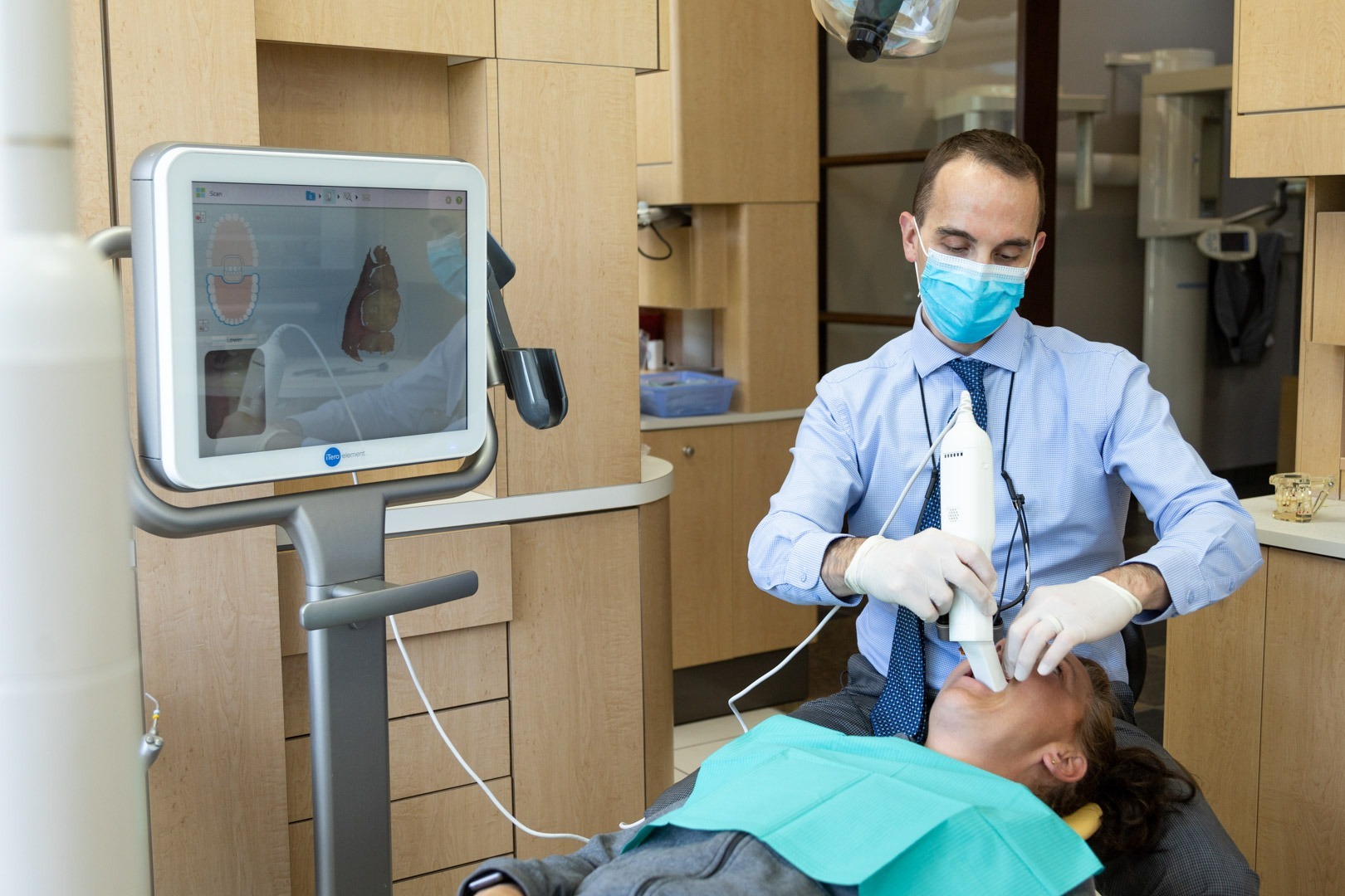 absolute-dentistry-general-and-family-dentist-okotoks-alberta-12 Dr. Wes Arbuckle with Patient | Absolute Dentistry | Family & General Dentist | Okotoks Dentist