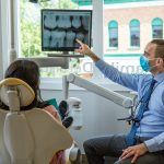 Dr. Wes Arbuckle with Patient | Absolute Dentistry | Family & General Dentist | Okotoks Dentist