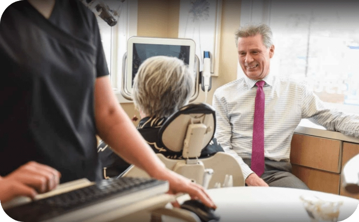 Depositphotos_14351511_xl-2015 (1) Dr. James Stobbe with Patient | Absolute Dentistry | Family & General Dentist | Okotoks Dentist